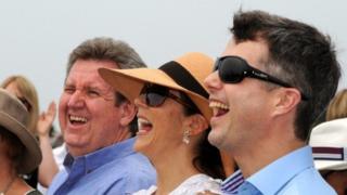 Denmark's Princess Mary (second right) and her husband Crown Prince Frederik (right)