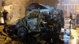 Damaged vehicle seen after blast in Istanbul, Turkey, 10 December 2016.