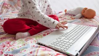 A child using a laptop