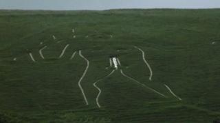 Cerne Giant with Theresa graffiti