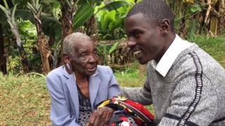 John Paul Mwirigi with his grandmother