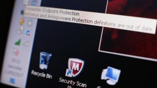 Computer screen with out of date software warning