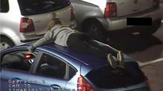 Girl on car roof