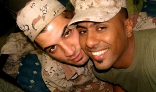 Btoo Allami (left) and Nayyef Hrebid hug