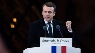 Emmanuel Macron addresses supporters, after winning the French election, at the Louvre on May 7, 2017 in Paris