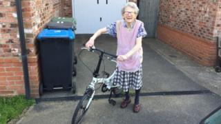 Mary Hampton and her bicycle