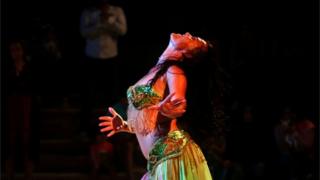 Belly dancer Julia Anderson of Britain performs for an audience at El Ain El Sokhna Resorts in Suez, east of Cairo, Egypt May 7, 2018.