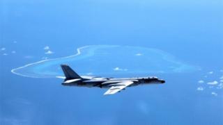 A Chinese H-6K bomber flying over the a reef in the South china Sea (File image)