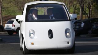 Transportation Secretary Anthony Foxx (R) and Google Chairman Eric Schmidt (L) ride in a Google self-driving car at the Google headquarters on February 2, 2015 in Mountain View, California.