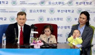 Robert Kelly, left, a political science professor at Pusan National University, holds a press conference with his wife Jung-a Kim, right, and children James and Marion at the university in Busan, South Korea, Wednesday, March 15, 2017