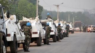 A picture taken in Bouake on January 6, 2017 shows an UN Blue Helmet peacekeepers convoy parked at the entrance of the city where soldiers demanding more pay and housing rose up earlier in the day.
