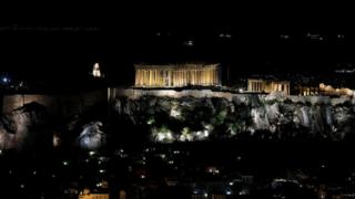 The ancient Parthenon temple is pictured atop the Acropolis hill before Earth Hour in Athens, Greece