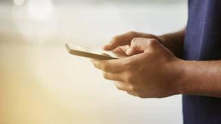 Mobile phone in hand