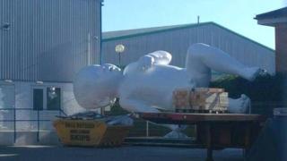 Very large sculpture of a baby
