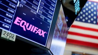A view of a sign for the company Equifax on the floor of the New York Stock Exchange in New York,, 12 September