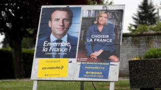 Cartazes das campanhas de Emmanuel Macron e Marine Le Pen
