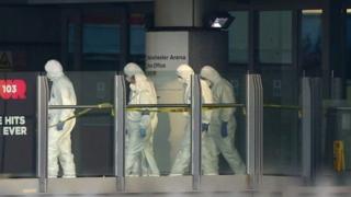 Forensic teams working at the site in Manchester