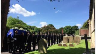 Funeral procession at St Mary's Church in Chieveley