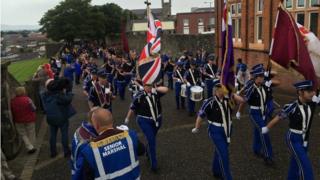 Bands taking part in the annual Apprentice Boys parade in Londonderry, bands marching around the city's historic walls, 12 August 2017