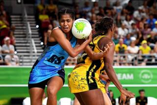 Unouna Rusivakula of Fiji competes against Jamaica in netball