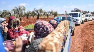 Syrians flee Afrin on 17 March 2018