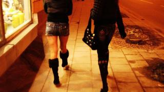 Women walking along street