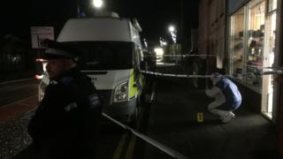 Police at Garnant Pharmacy