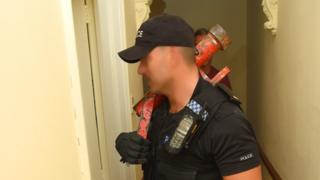 Police officer with enforcer