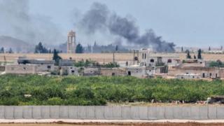 Smoke rises from attacks on IS targets just inside Syria (May 2016)
