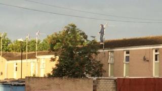 Man on roof