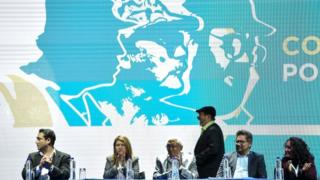 FARC leader Rodrigo Londono Echeverri, known as "Timochenko"(C) gets ready to speak during the opening of their National Congress in Bogota on August 27, 2017.