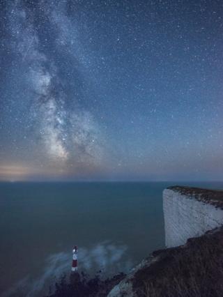 a Perseid meteor shower over sea