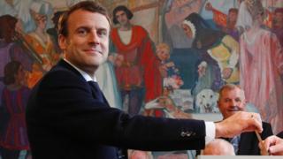 Emmanuel Macron casts his ballot in Le Touquet, northern France