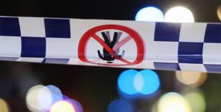 Close up file image of police tape, near the Lindt Chocolate Cafe in Martin Place, Sydney, Australia, 16 December 2014.