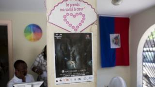 A Massimadi festival poster hangs at the Kouraj organization office in Port-au-Prince, Haiti, Tuesday Sept. 27, 2016.