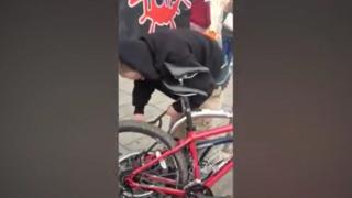 Man stealing bike