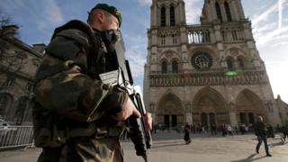 Armed French soldier outside Notre Dame, Paris, on 24 December 2015