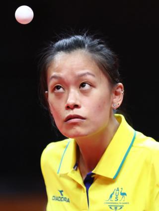 Tracy Feng of Australia competes during the table tennis women team preliminary rounds against Mauritius.