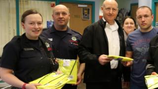 Wisbech firefighters giving out jackets