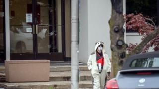 A man in a panda costume outside a TV station in Baltimore. Photo: 28 April 2016