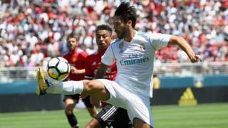 Isco of Real Madrid controls the ball in front of Jesse Lingard of Manchester United during the International Champions Cup match at Levi's Stadium on July 23, 2017 in Santa Clara, California