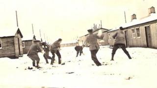 German soldiers having a snowball fight