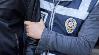 Gözaltına alınan bir kişi