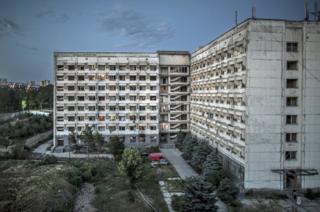 A view of the building and courtyard as seen from an adjacent building