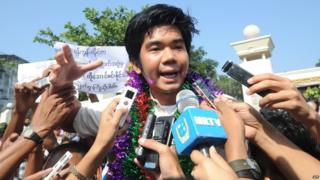File photo: Peace activist Yan Naing Tun talks to the media after his release in front of Insein prison in Yangon, 31 December 2013