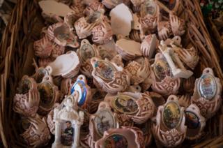 A basket of holy water fonts