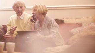 senior couple on the phone
