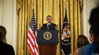 US President Barack Obama speaks during a news conference - 15 July