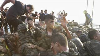 Images from Turkey appear to show captured soldiers being beaten up by civilians