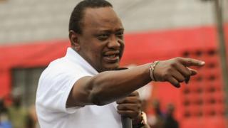 Kenya's President Uhuru Kenyatta addresses a crowd on September 1, 2017 in a Nairobi suburb